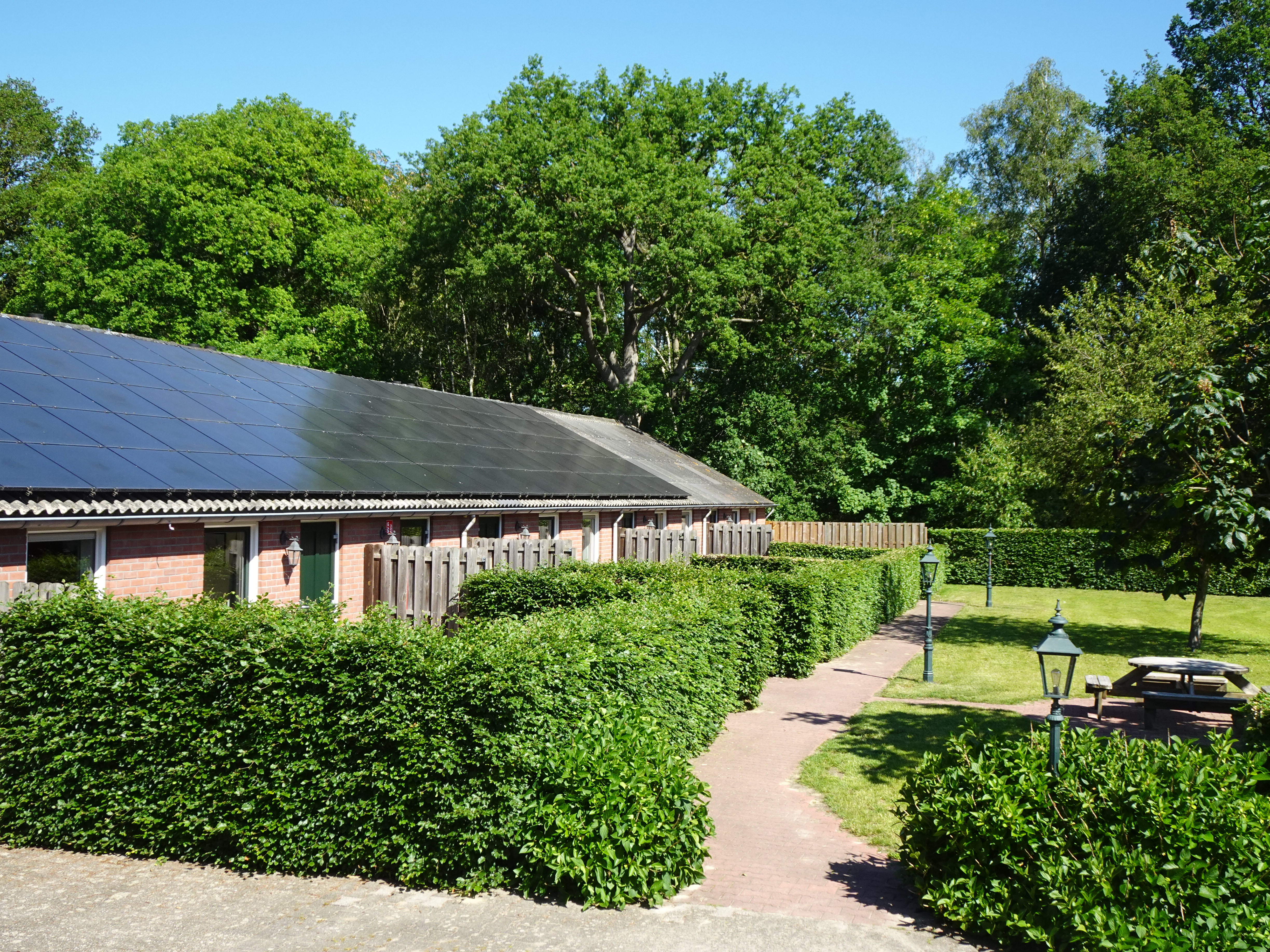 Vakantiehuis voor 12 personen op bosrijke camping in Ruurlo
